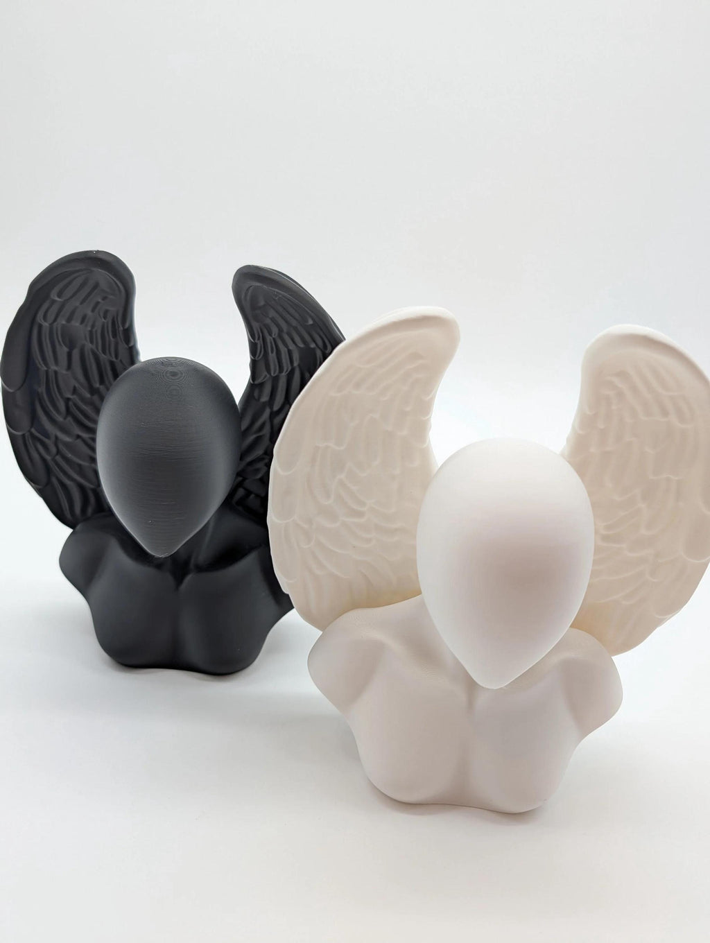 Ethereal Sentinels: The Faceless Angel Statue